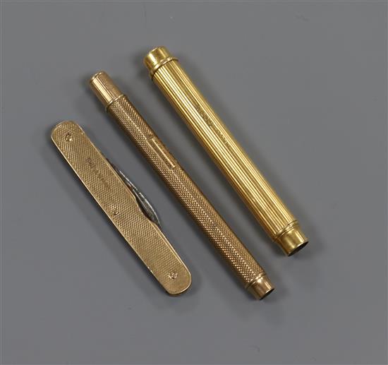 A 9ct gold mounted penknife, a 9ct gold pencil and an 18ct gold pencil.